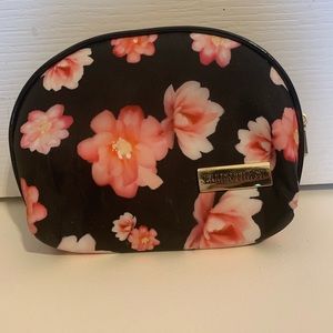 Small black make up bag with pink flowers